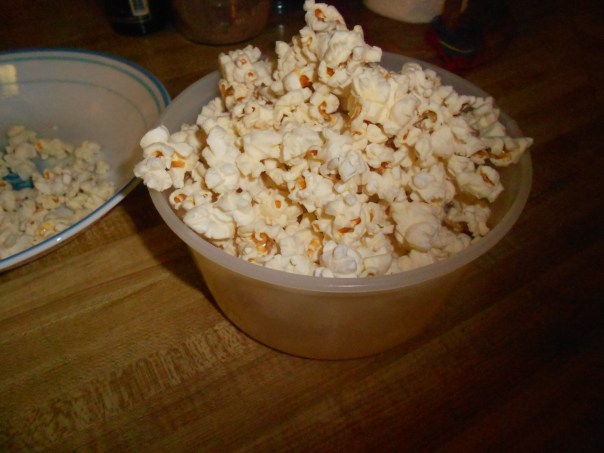 In retrospect I probably should have found a nicer bowl to put my popcorn in, rather than an old sherbet container...but hey, this is the Poor Couple's Food Guide, not the Ritz.