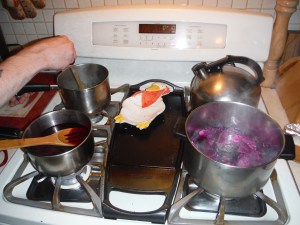 Four stove burners = hot kitchen